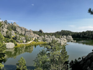 Sylvan Lake surrounded by granite rock formations in Custer State Park, South Dakota.
